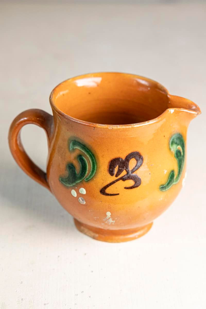 Early 20th Century French Glazed Terracotta Miniature Pitcher with Folk Slip Decoration - JAA