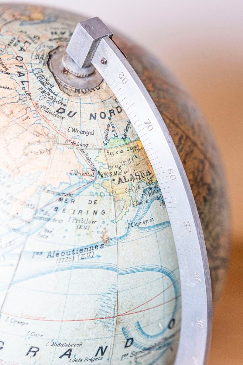 Small French 20th Century Terrestrial Globe on Turned Black Wooden Base - JAA