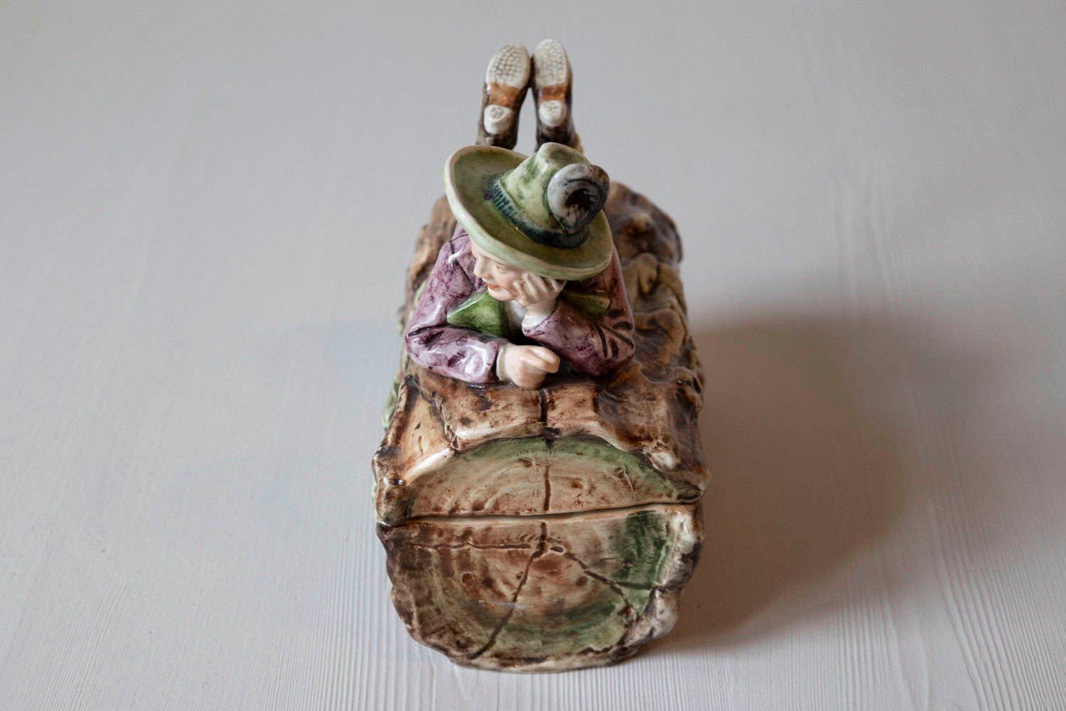 French 19th Century Barbotine Bonbon Box Depicting a Boy Laying on a Tree Trunk - JAA