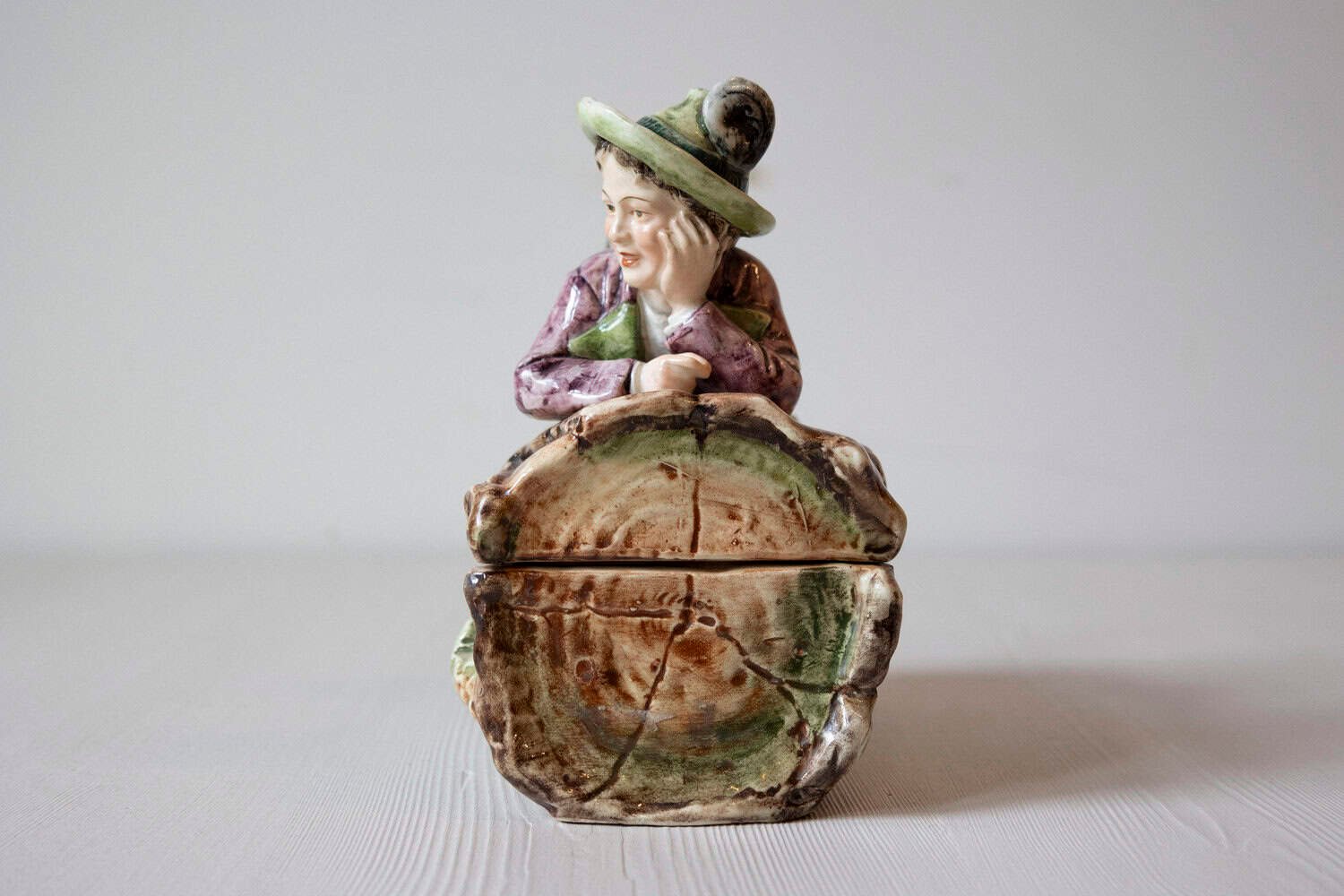 French 19th Century Barbotine Bonbon Box Depicting a Boy Laying on a Tree Trunk - JAA