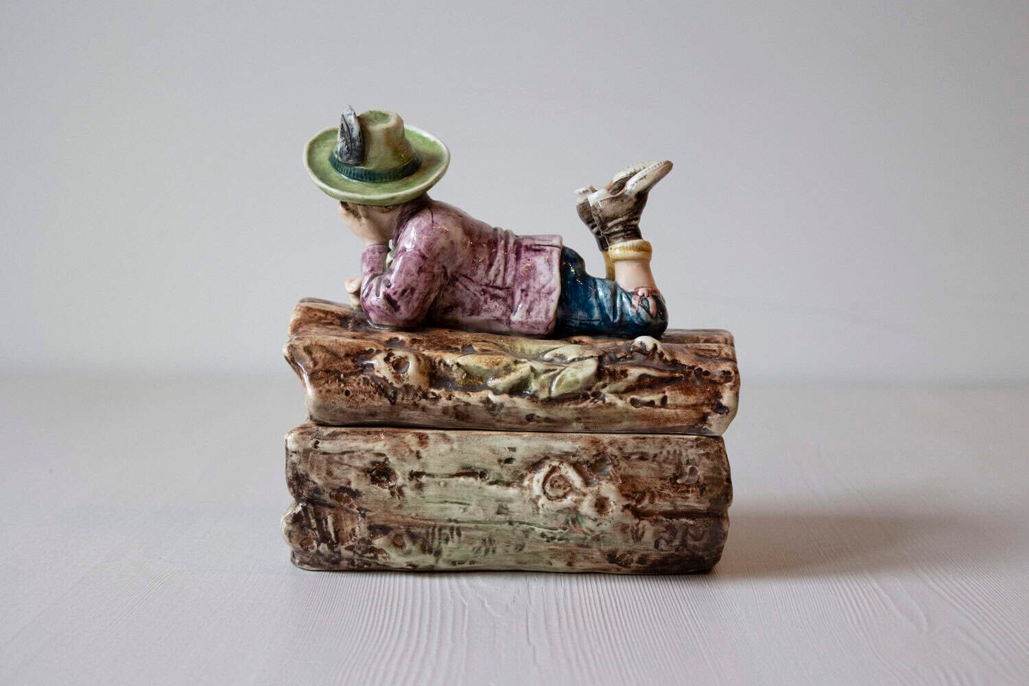 French 19th Century Barbotine Bonbon Box Depicting a Boy Laying on a Tree Trunk - JAA