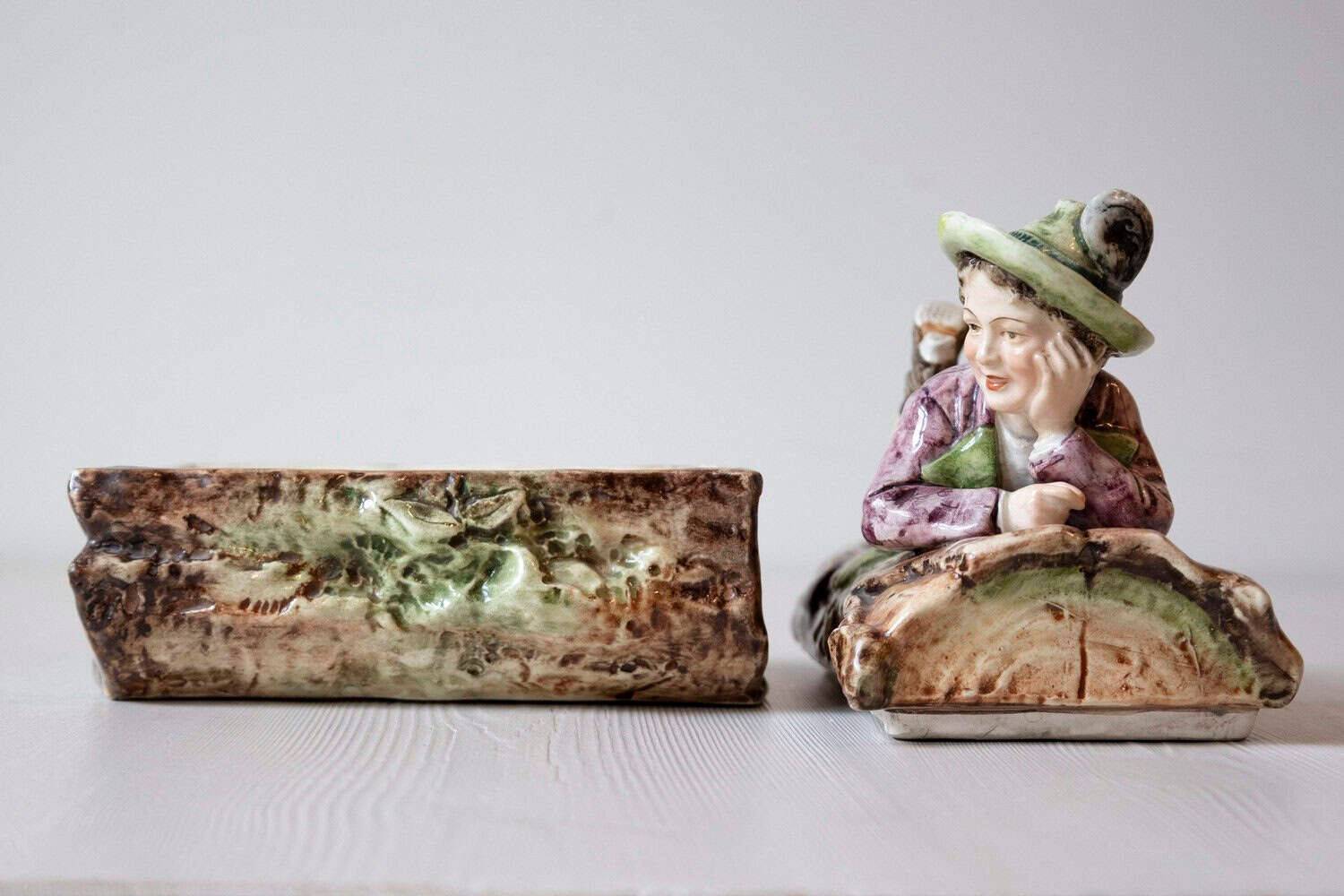 French 19th Century Barbotine Bonbon Box Depicting a Boy Laying on a Tree Trunk - JAA