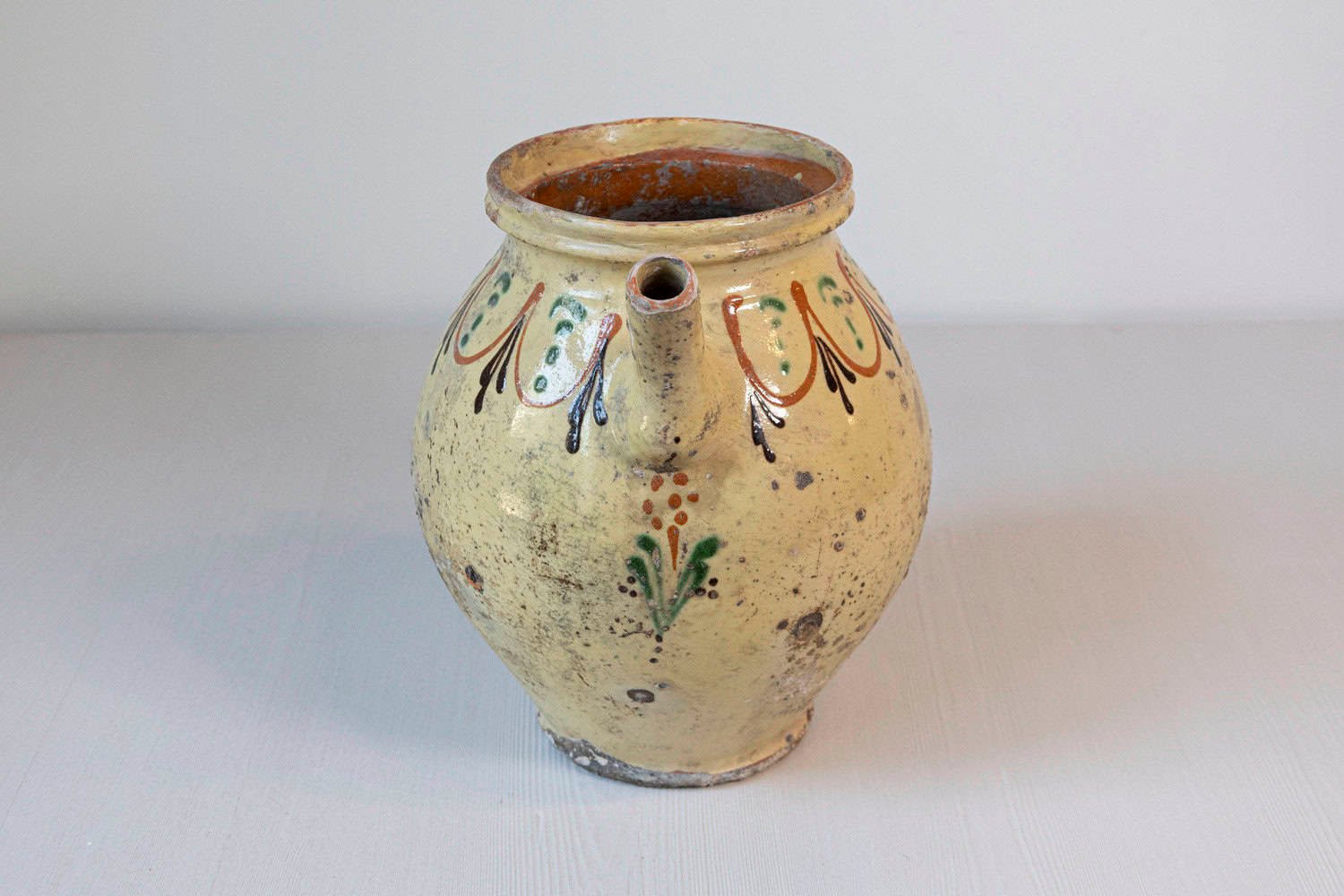 French 19th Century Rustic Glazed Pottery Olive Oil Pot with Polychrome Motifs - JAA