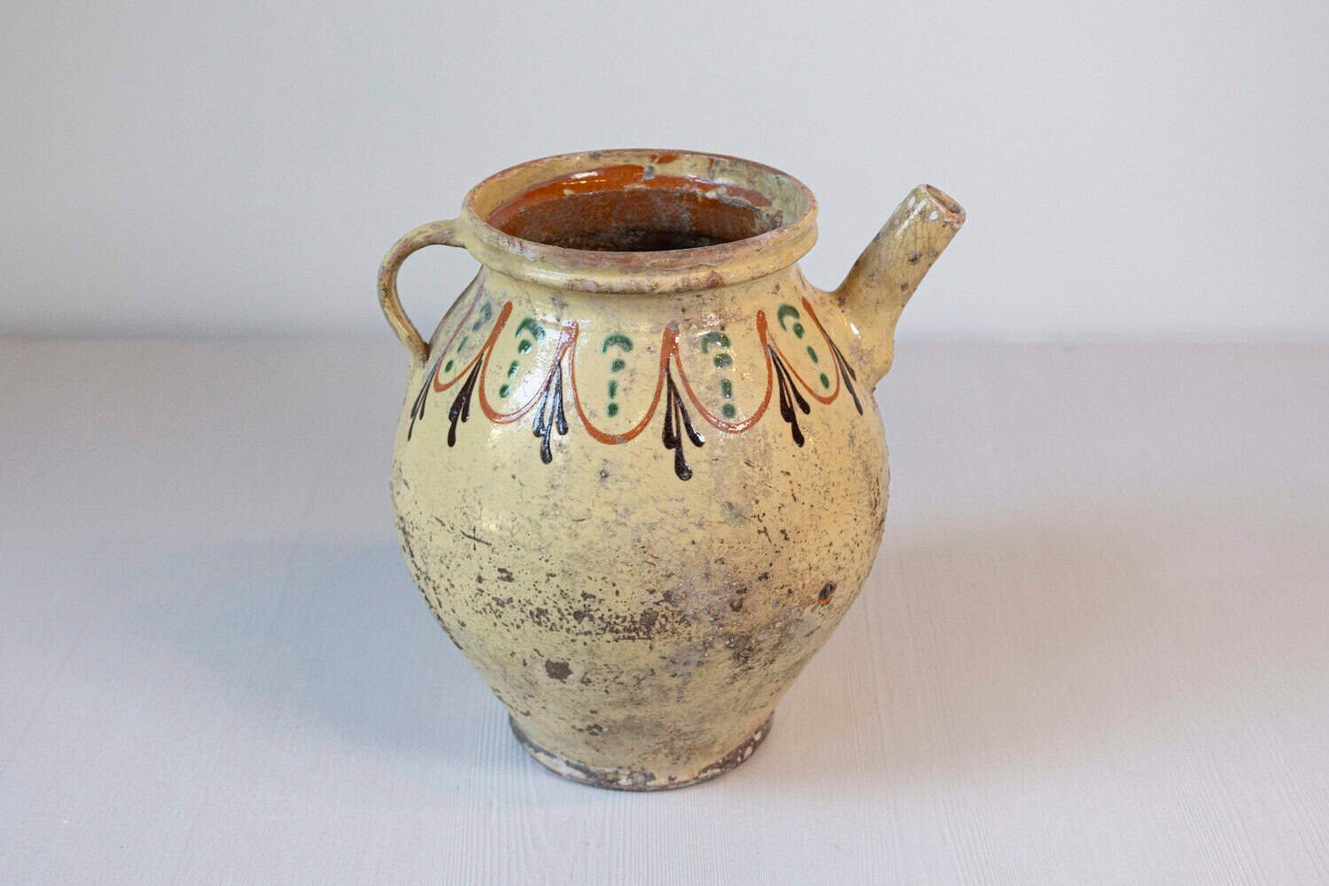 French 19th Century Rustic Glazed Pottery Olive Oil Pot with Polychrome Motifs - JAA