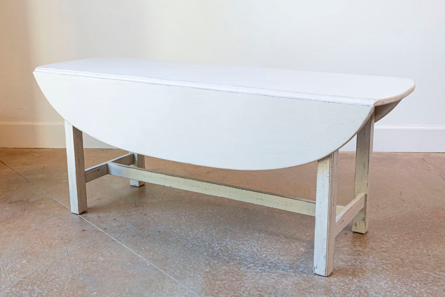 Swedish 1920s Gray Painted Drop Leaf Coffee Table with Oval Top and Stretcher - JAA