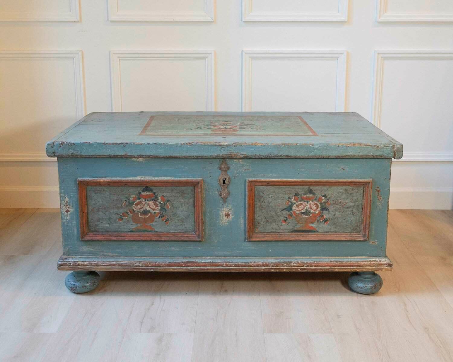 Alpine Early 19th Century Blue-Painted Fir Chest with Floral Vase Panels and Bun Feet - JAA