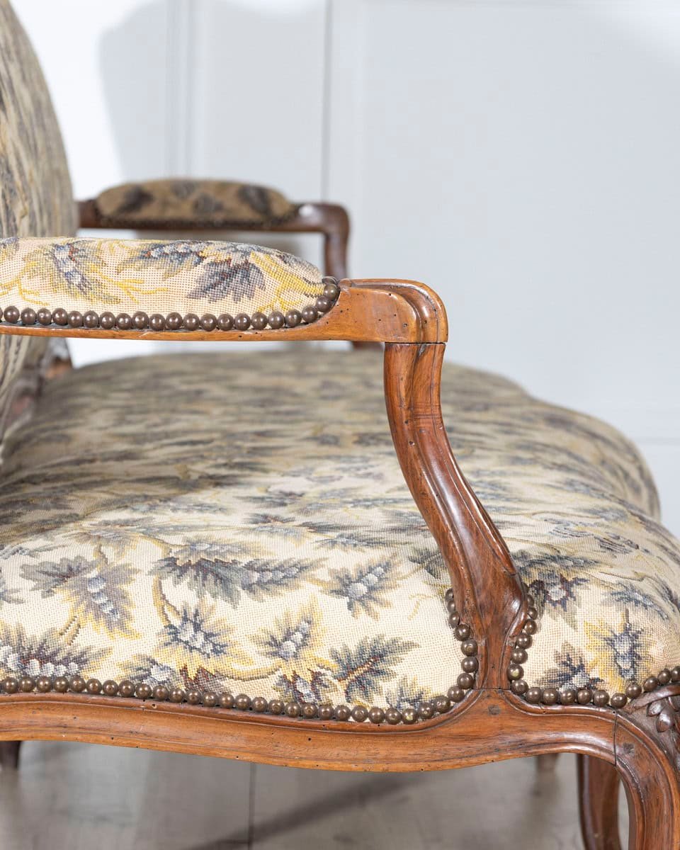 18th Century Louis XV Period Walnut Sofa with Floral Carvings and Tapestry Upholstery - JAA