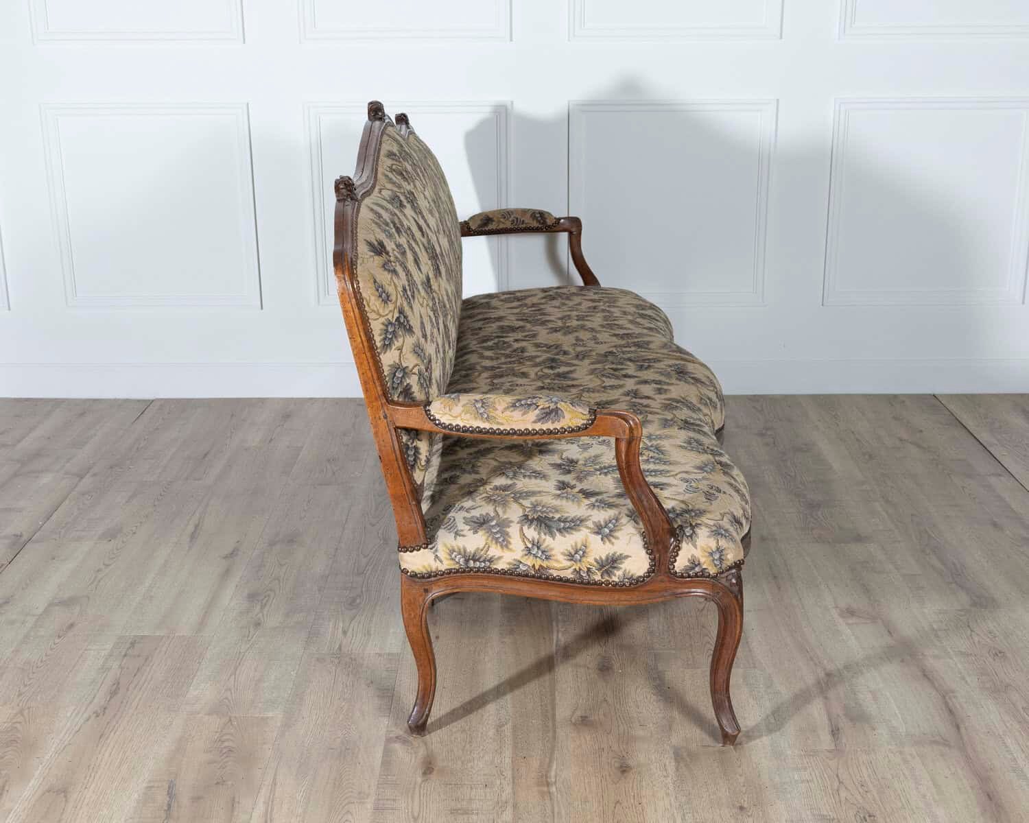 18th Century Louis XV Period Walnut Sofa with Floral Carvings and Tapestry Upholstery - JAA