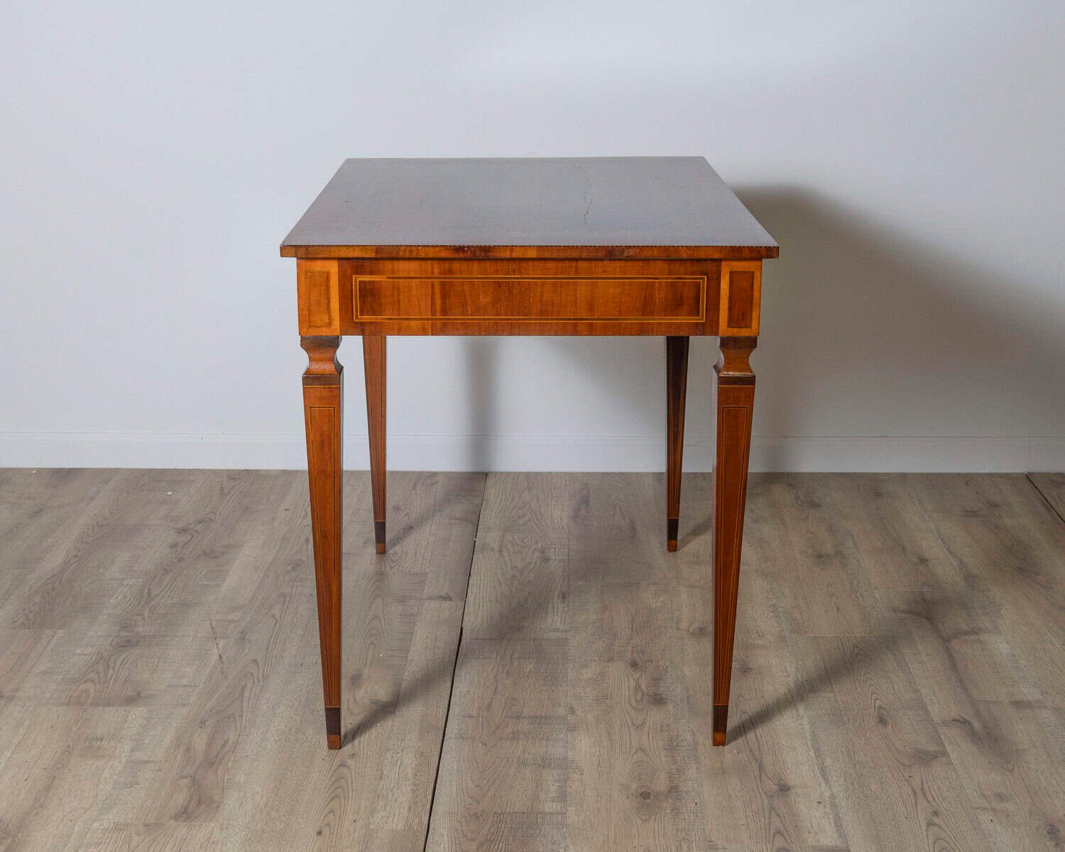 A very elegant walnut table/desk with a central drawer - JAA