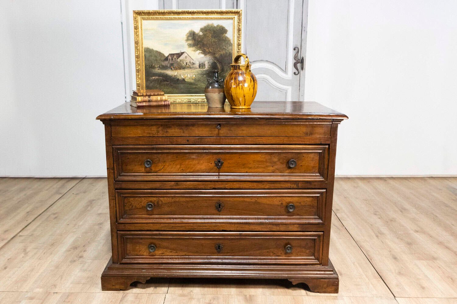 Italian 17th Century Walnut Four-Drawer Commode with Carved Bracket Feet - JAA