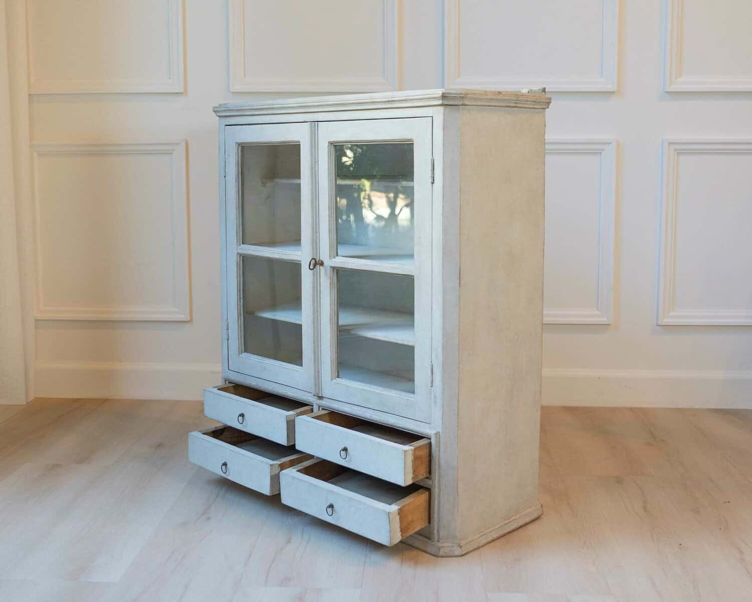 A hanging cabinet from Sweden with glass doors in grey - JAA
