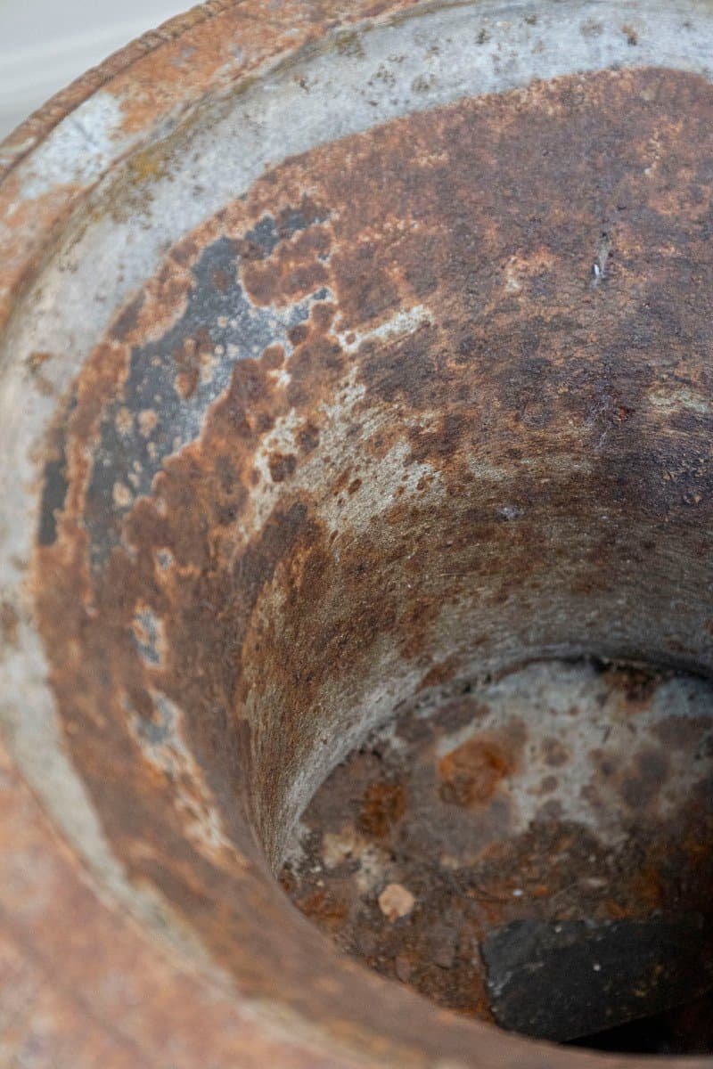 French 19th Century Pair of Iron Médicis Vases on Stepped Pedestals with Patina - JAA