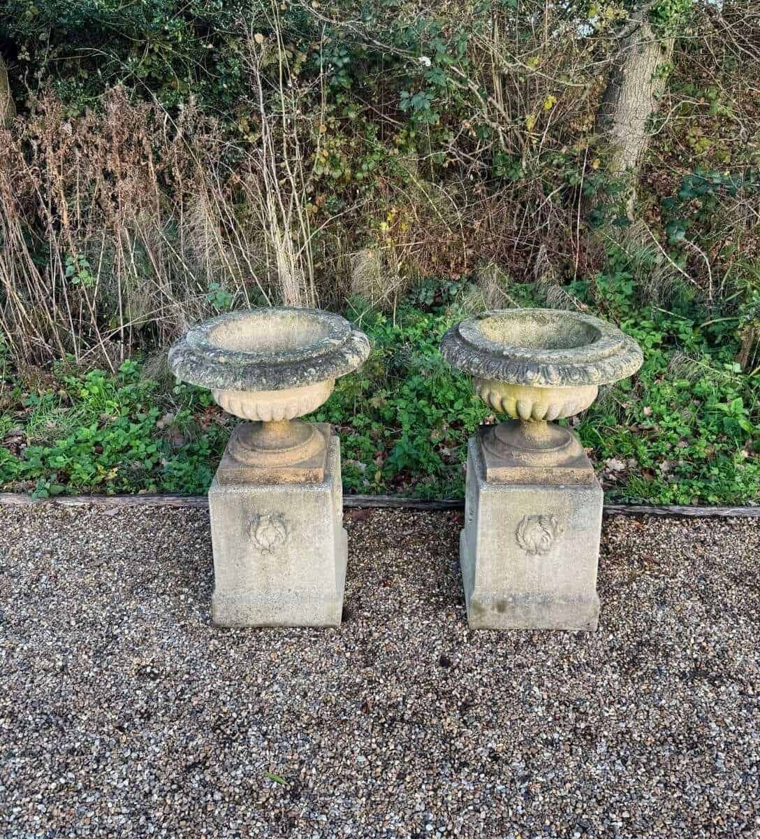 English 20th Century Pair of Neoclassical Cast-Stone Garden Urns on Pedestals with Weathered Patina - JAA