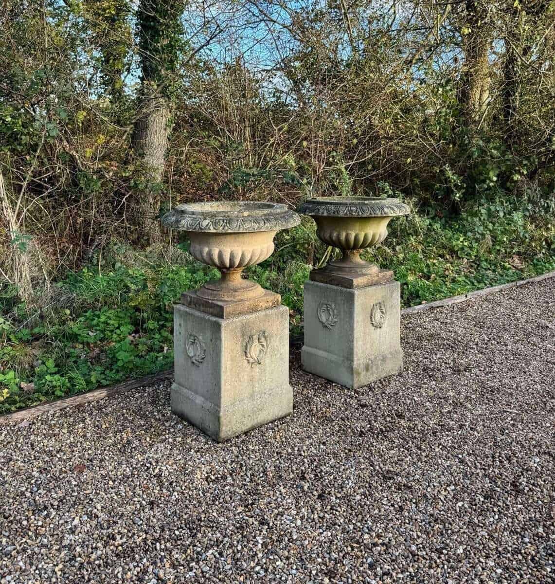 English 20th Century Pair of Neoclassical Cast-Stone Garden Urns on Pedestals with Weathered Patina - JAA