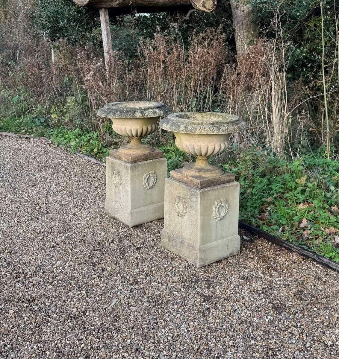 English 20th Century Pair of Neoclassical Cast-Stone Garden Urns on Pedestals with Weathered Patina - JAA