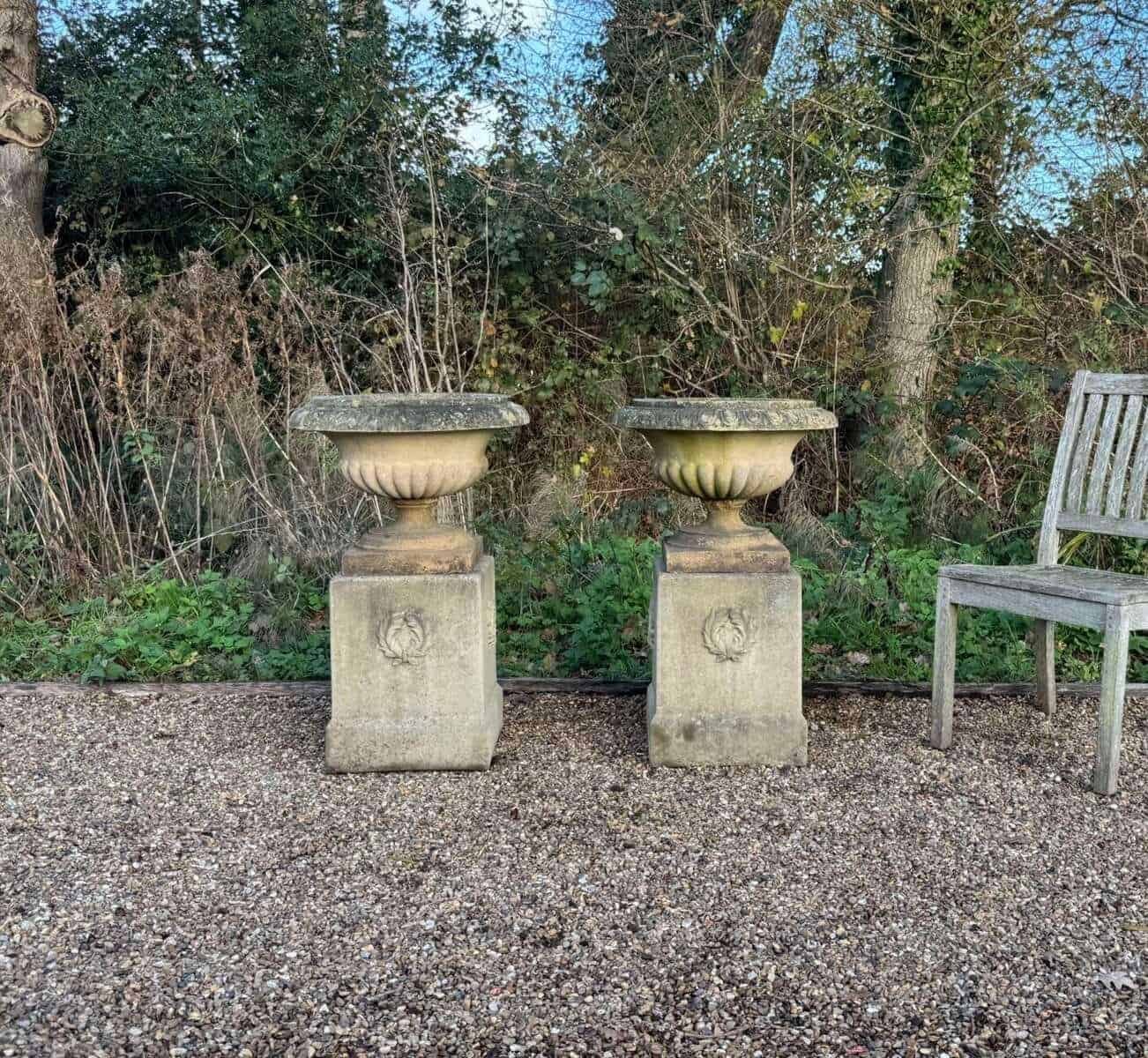 English 20th Century Pair of Neoclassical Cast-Stone Garden Urns on Pedestals with Weathered Patina - JAA