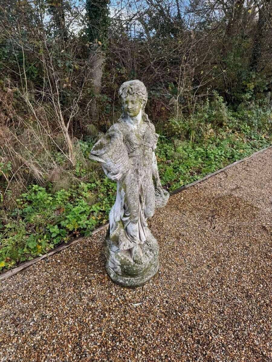 English Late 20th Century Composite Stone Garden Figure with Basket and Weathered Patina - JAA