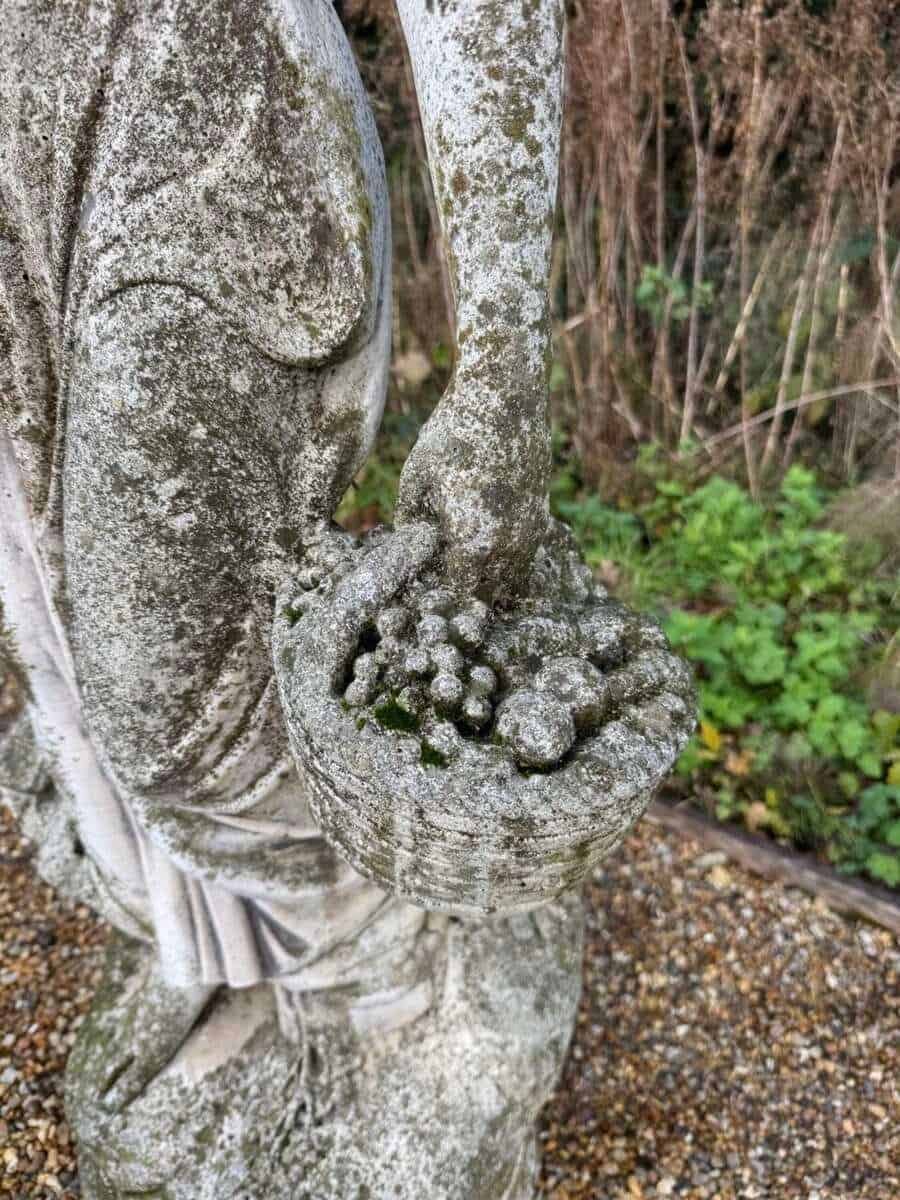 English Late 20th Century Composite Stone Garden Figure with Basket and Weathered Patina - JAA