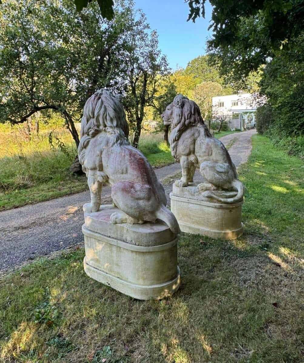 English 20th Century Pair of Monumental Cast-Stone Lions on Pedestals with Weathered Patinas - JAA