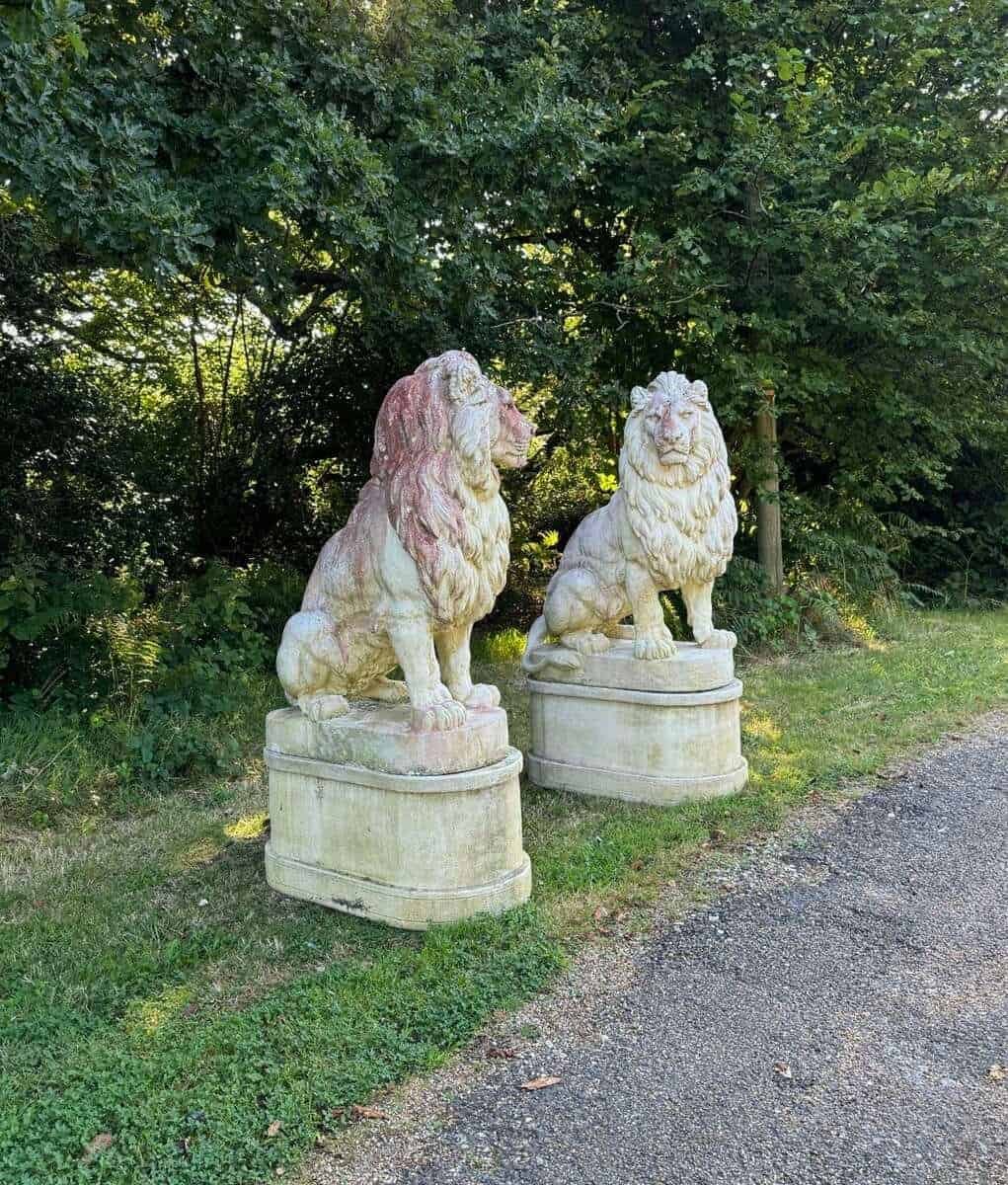 English 20th Century Pair of Monumental Cast-Stone Lions on Pedestals with Weathered Patinas - JAA