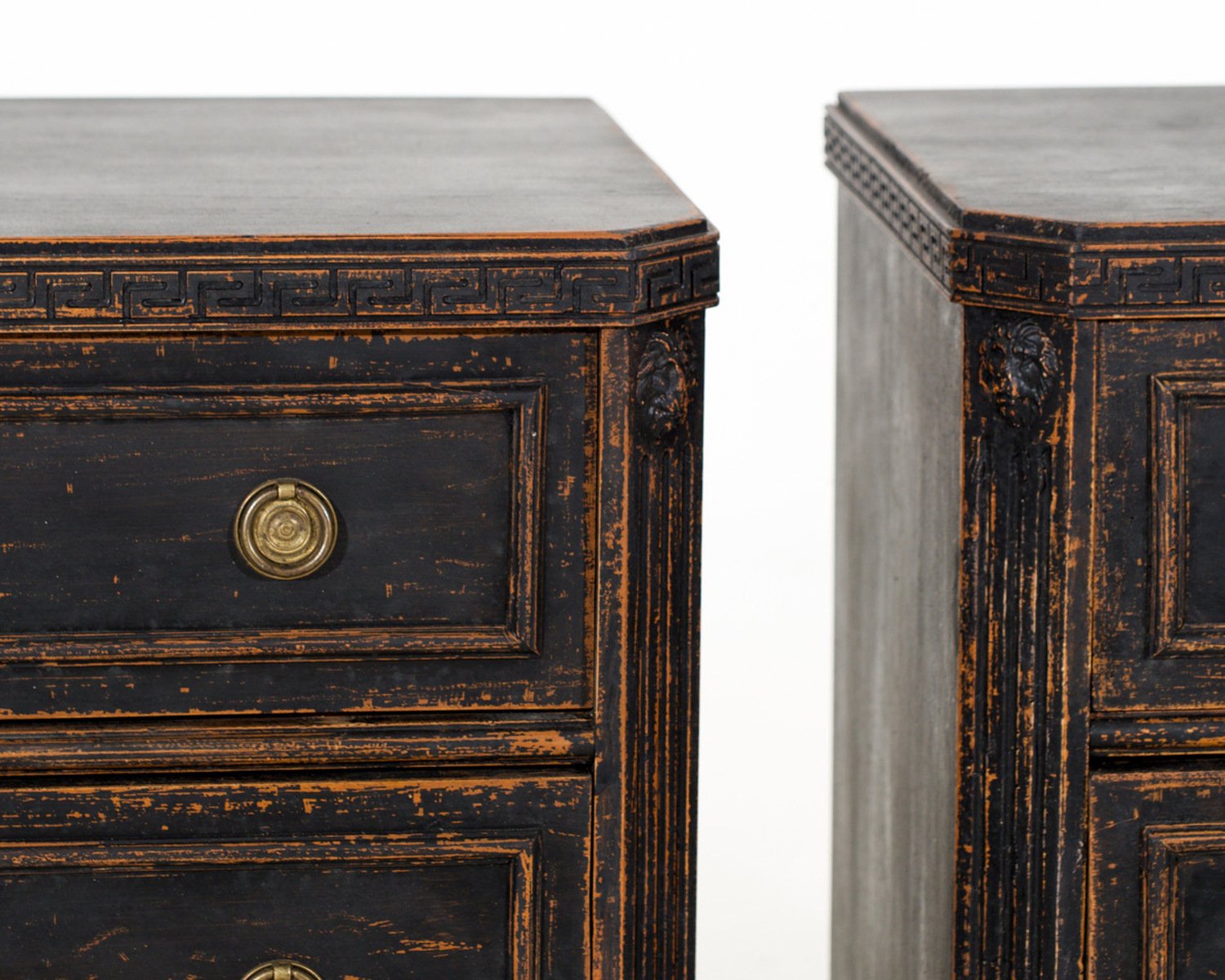 Pair of black Scandinavian chests of drawers, richly carved, 19th Century. - JAA