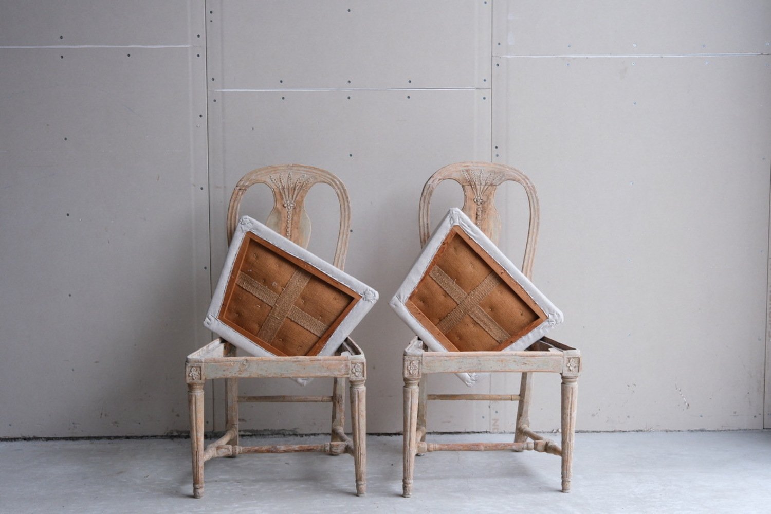 A pair of provincial period Gustavian Chairs Scraped to original paint and newly covered in linen. circa 1800 - JAA