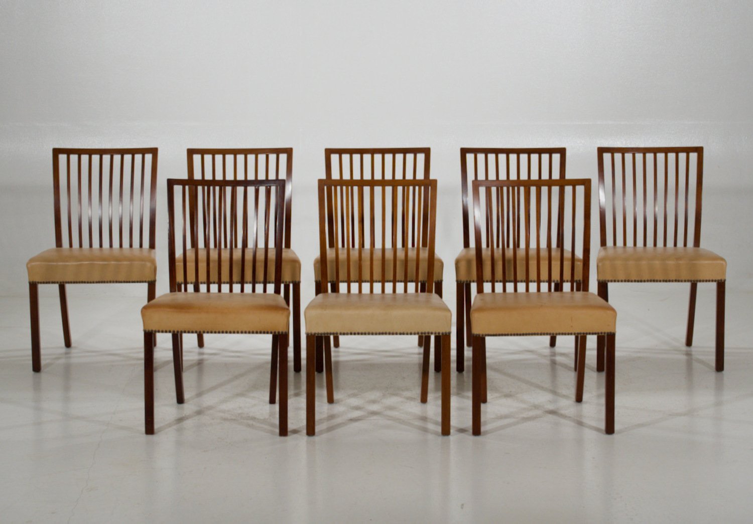 Eight fantastic mahogany chairs with leather seats by A.J Iversens in Copenhagen, circa 1960’s. - JAA
