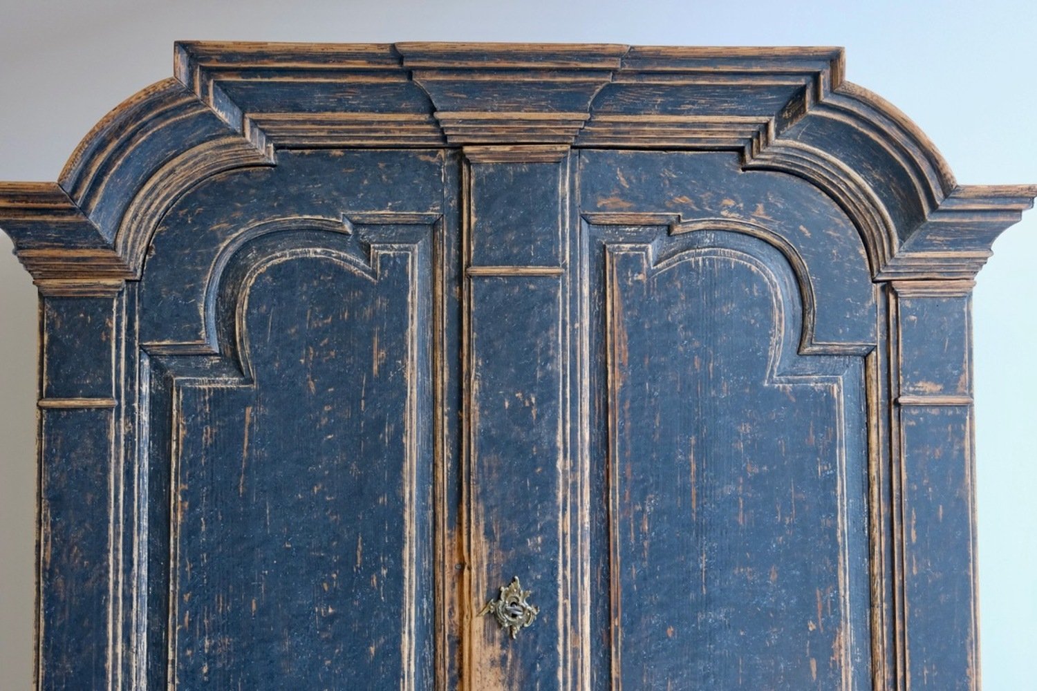 A period rococo cabinet with unusual door panels repainted in black and with a bluish grey interiorior. Original hardware circa 1760 - JAA