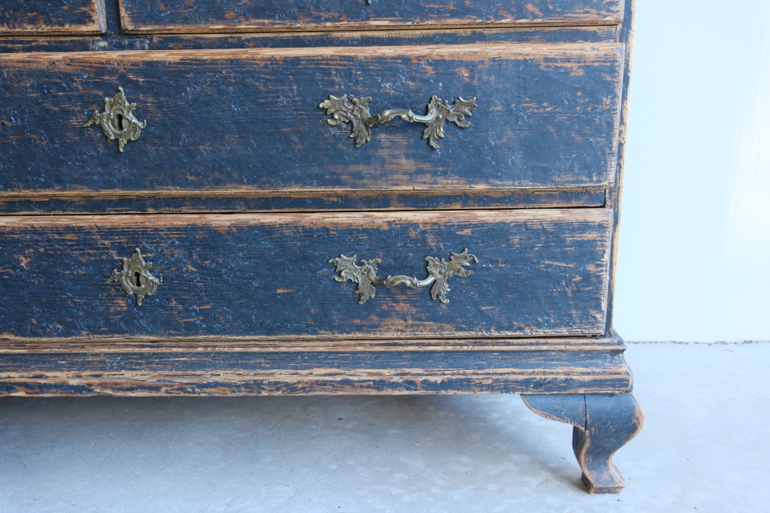 A period rococo cabinet with unusual door panels repainted in black and with a bluish grey interiorior. Original hardware circa 1760 - JAA