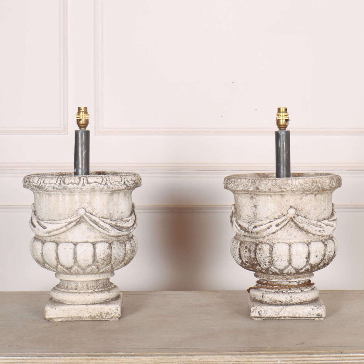 Pair of 1920s reconstituted stone urn table lamps. - JAA