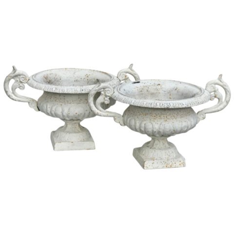 An excellent pair of 19th century cast iron garden urns with twin scrolled handles