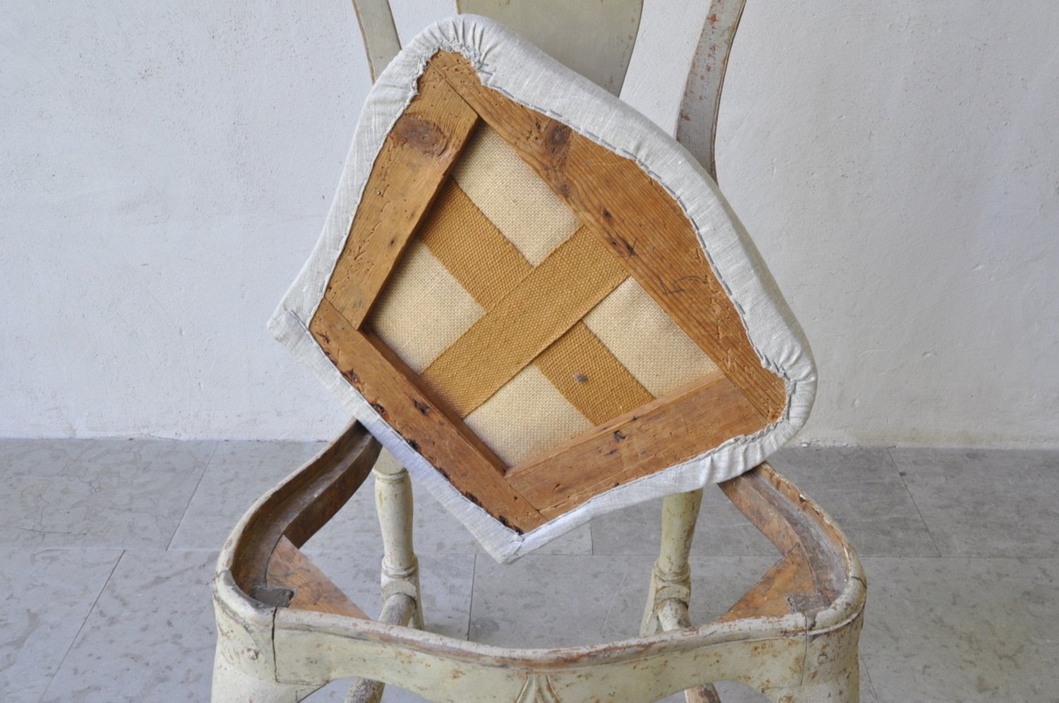 A period rococo chair, scrape to original paint and newly upholstered in linen. Circa 1770 - JAA