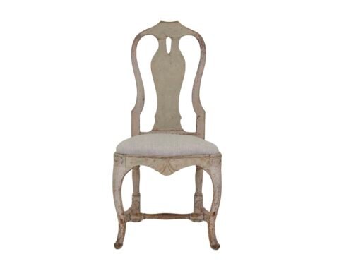 A period rococo chair, scrape to original paint and newly upholstered in linen. Circa 1770