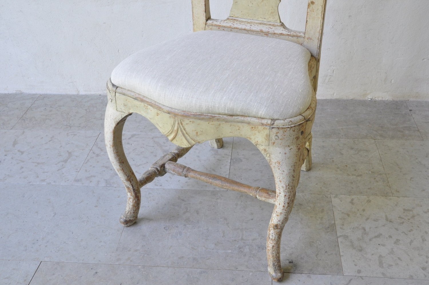 A period rococo chair, scrape to original paint and newly upholstered in linen. Circa 1770 - JAA