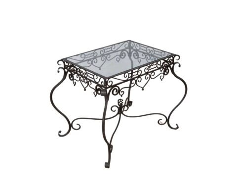 In the style of Edgar Brandt: hammered iron ceremonial table, Art Deco period, circa 1940, glass top.