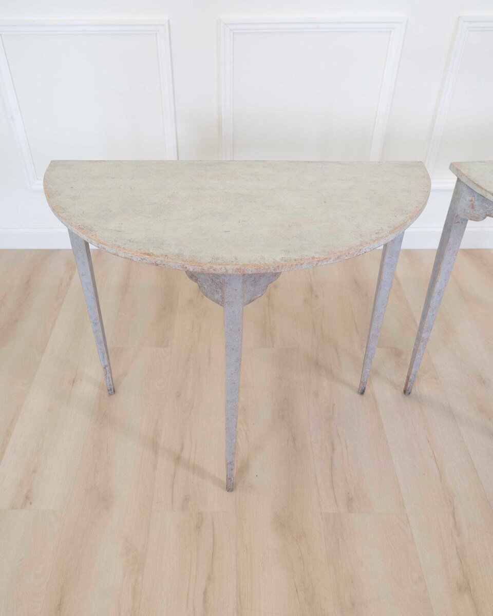 A pair of antique demi lune console tables from Sweden - JAA