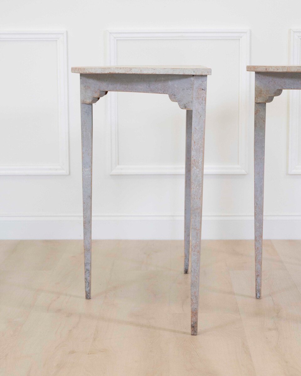 A pair of antique demi lune console tables from Sweden - JAA