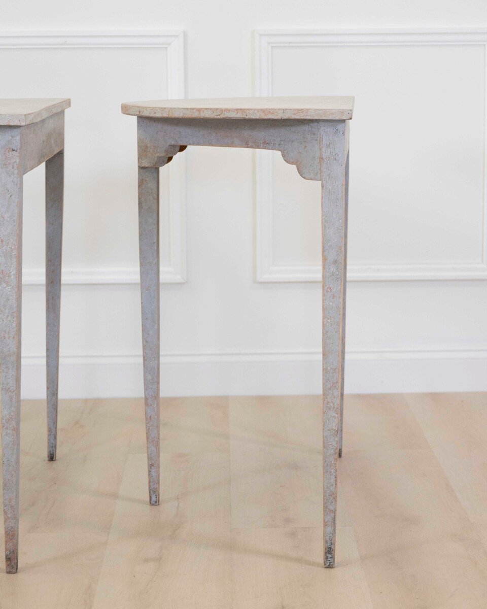 A pair of antique demi lune console tables from Sweden - JAA