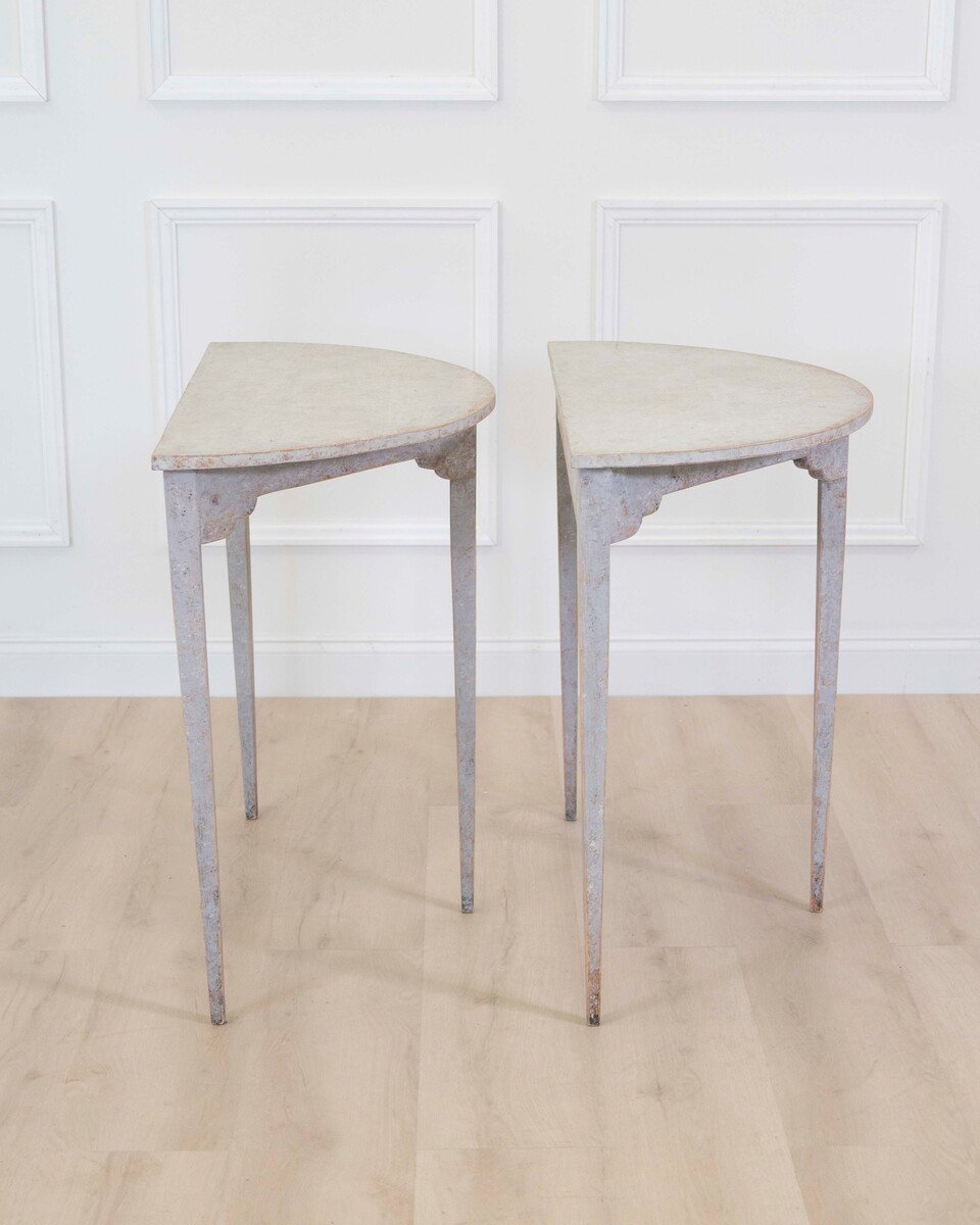 A pair of antique demi lune console tables from Sweden - JAA