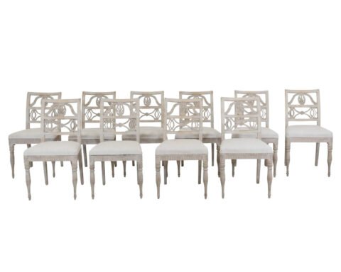 A matched set of 10 unusual period Gustavian chairs, made in Lindome, repainted and newly upholstered in linen