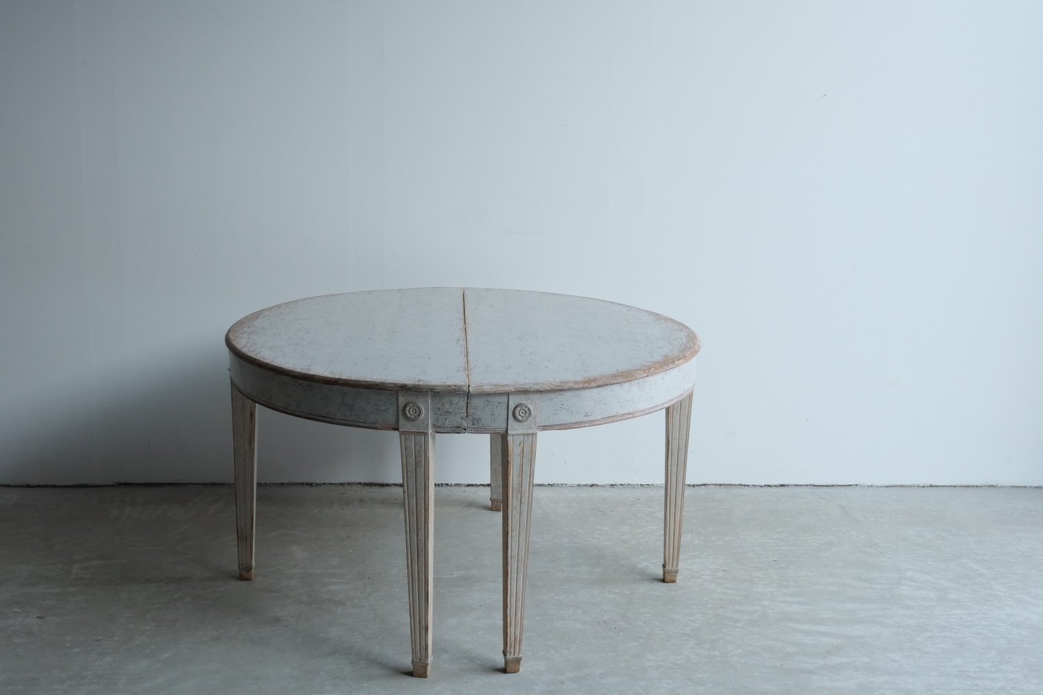 A large pair of mid 19th century Gustavian style demi lune tables, repainted in grey. - JAA