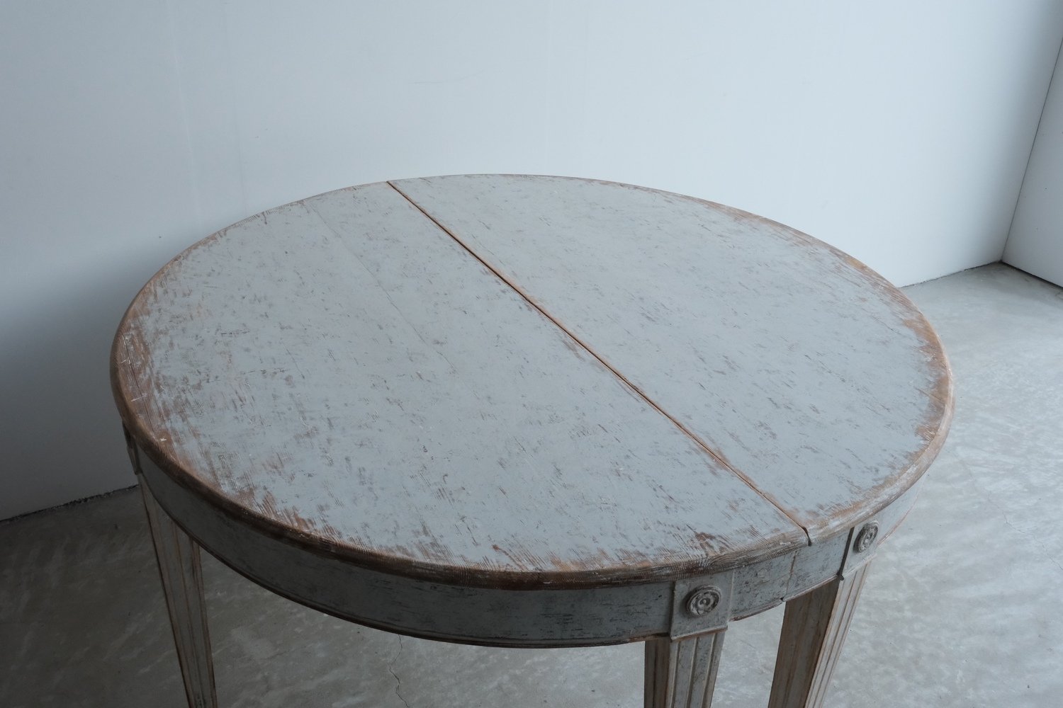 A large pair of mid 19th century Gustavian style demi lune tables, repainted in grey. - JAA