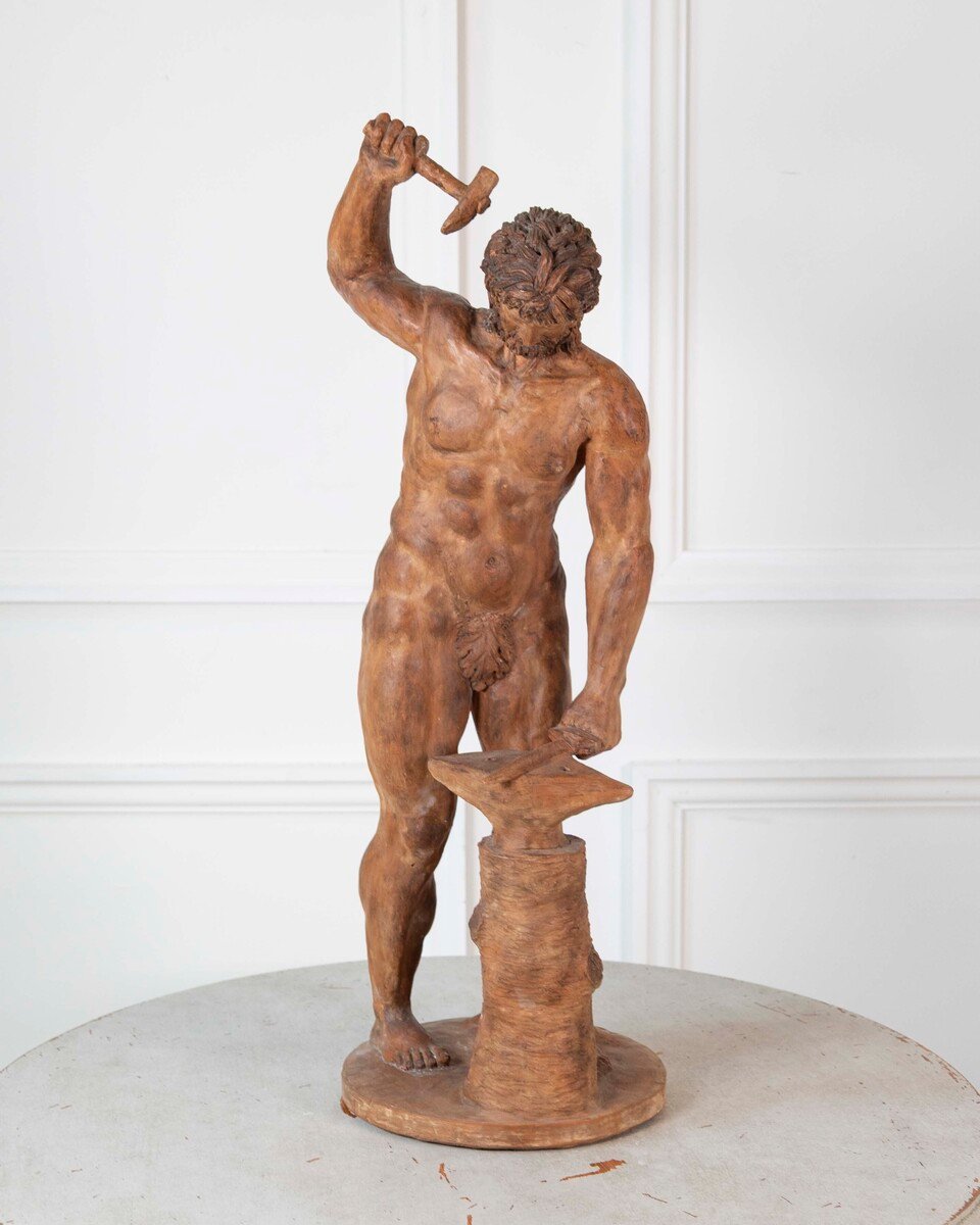 19th Century Italian Terracotta Statuette of Vulcan Forging a Dagger on an Anvil - JAA