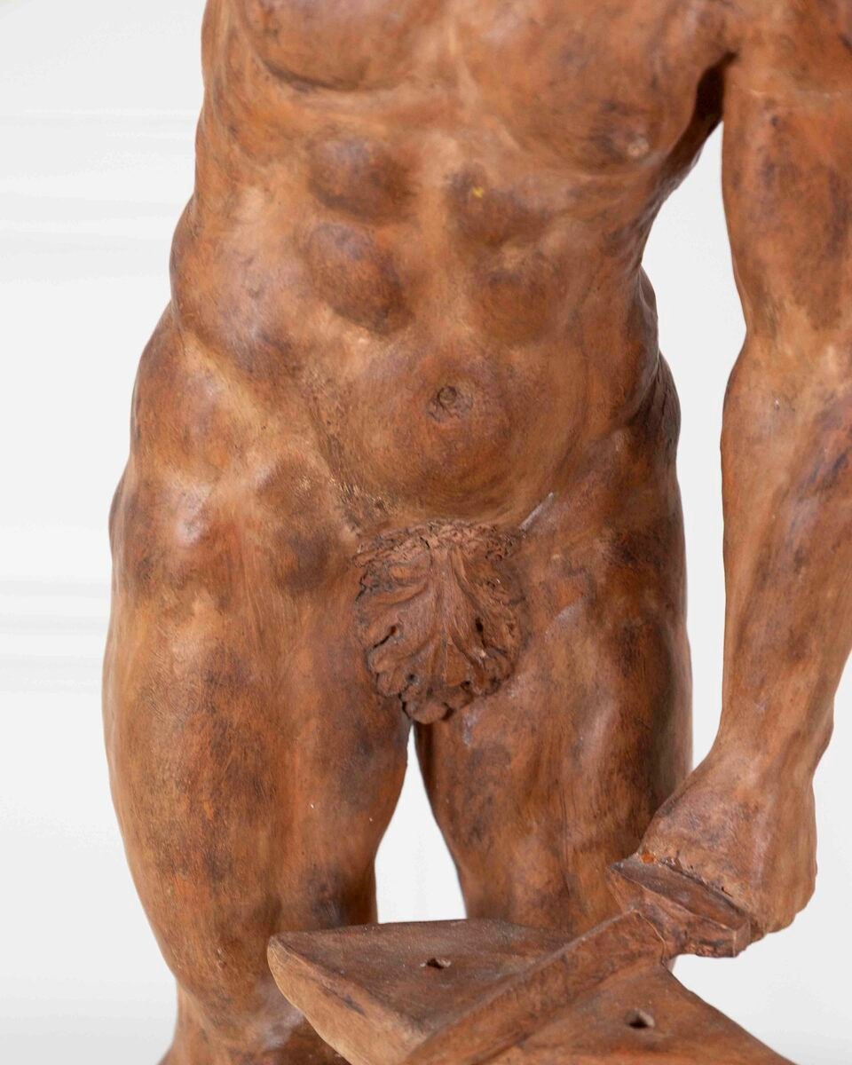 19th Century Italian Terracotta Statuette of Vulcan Forging a Dagger on an Anvil - JAA