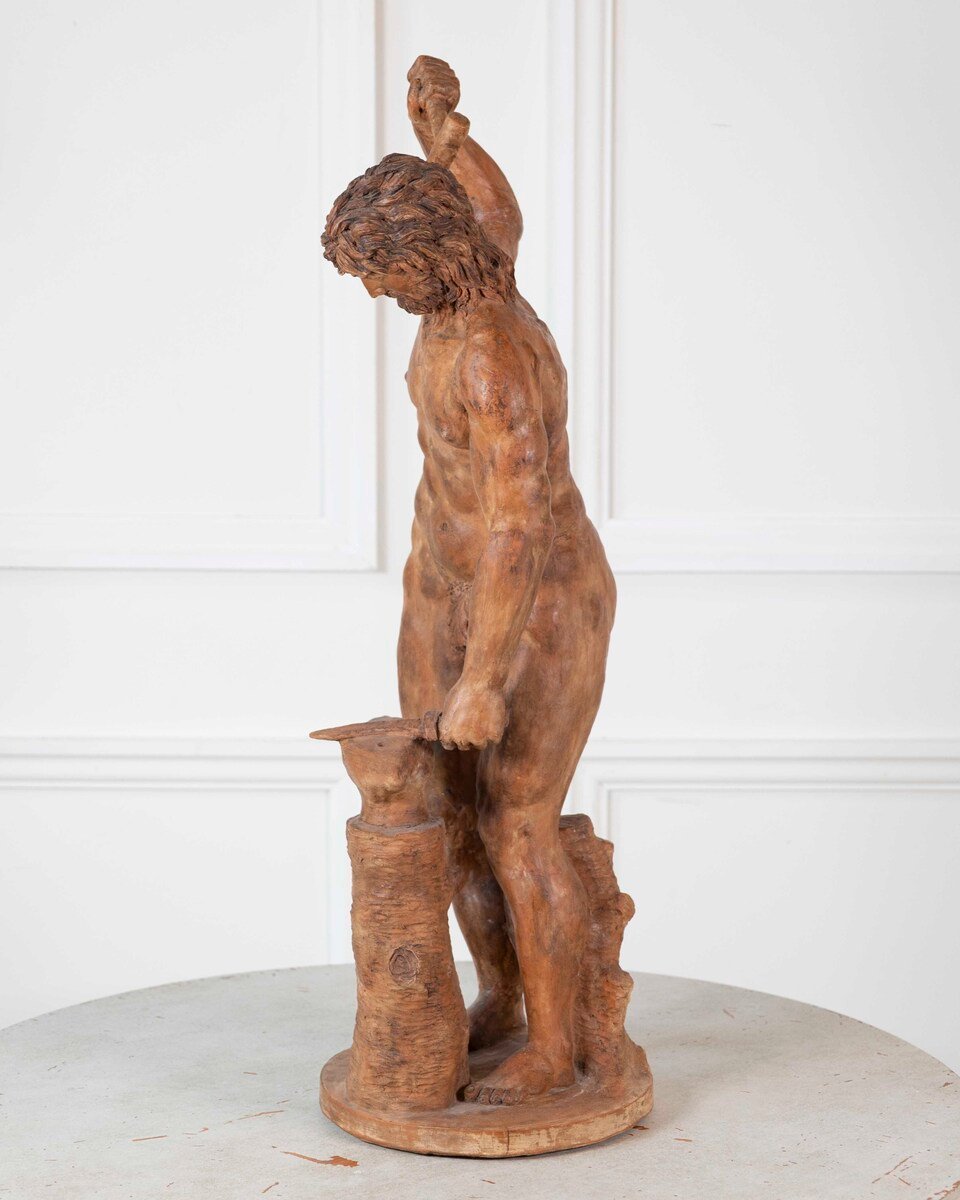 19th Century Italian Terracotta Statuette of Vulcan Forging a Dagger on an Anvil - JAA