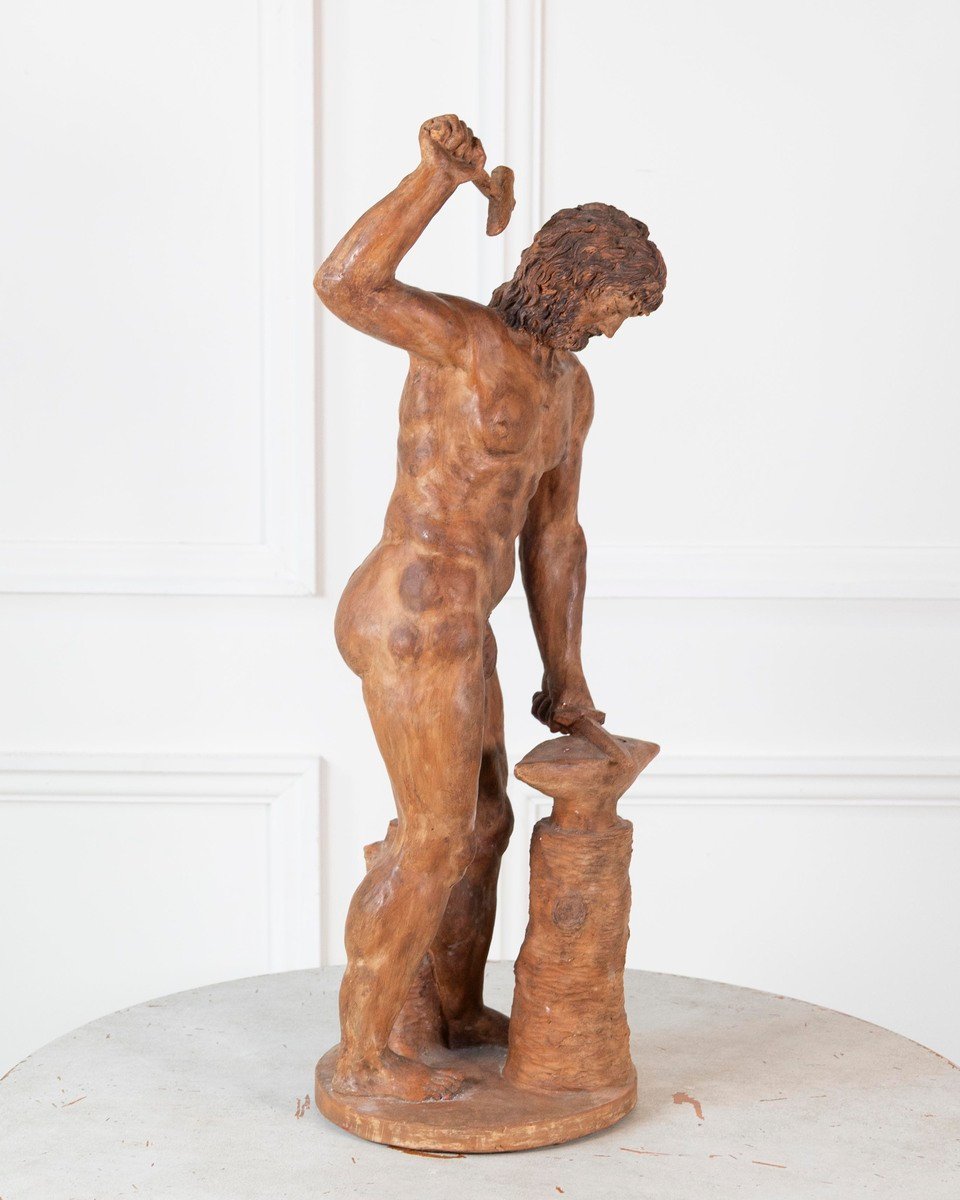 19th Century Italian Terracotta Statuette of Vulcan Forging a Dagger on an Anvil - JAA