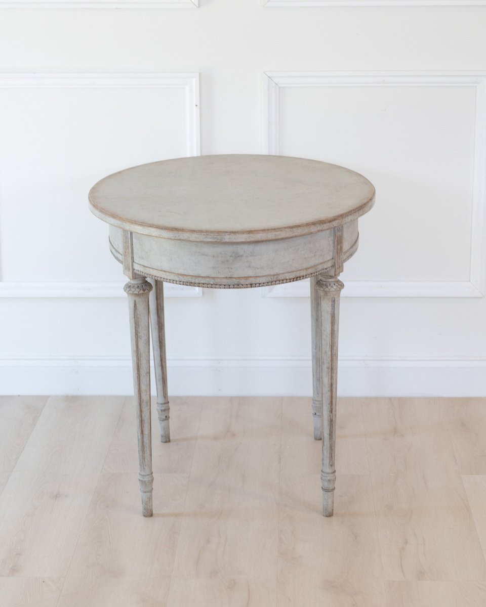 Oval table in the Gustavian style is finished in grey. - JAA