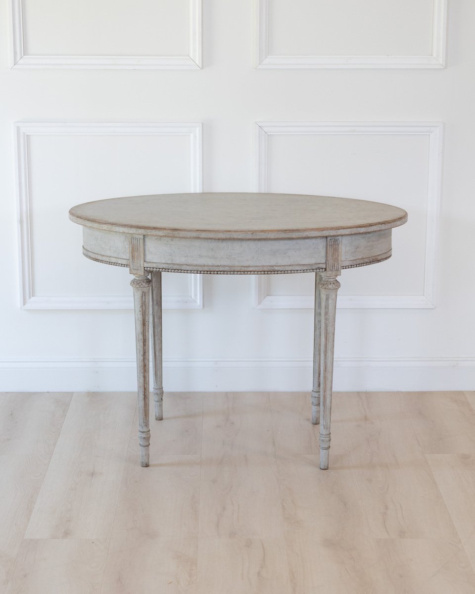 Oval table in the Gustavian style is finished in grey. - JAA