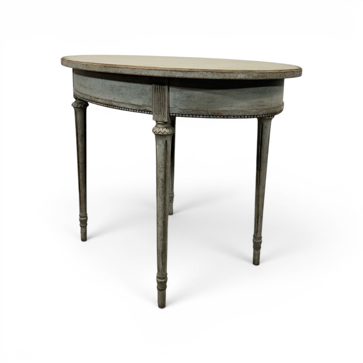 Oval table in the Gustavian style is finished in grey. - JAA