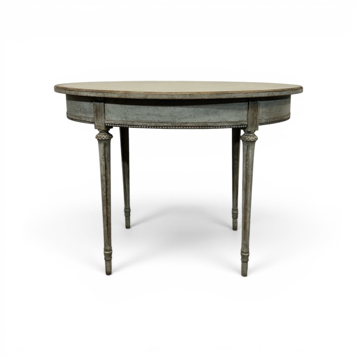 Oval table in the Gustavian style is finished in grey. - JAA